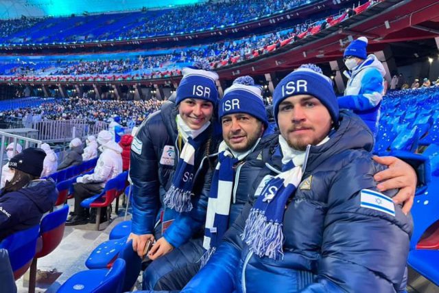 Barnabas Szollos with his sister Noa and his father Peter at the opening ceremony of the 2022 Winter Games, where Barnabas finished sixth in the combined event with a fantastic performance